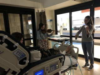 Music Calms the Heart-Stout Girls Serenading Dad